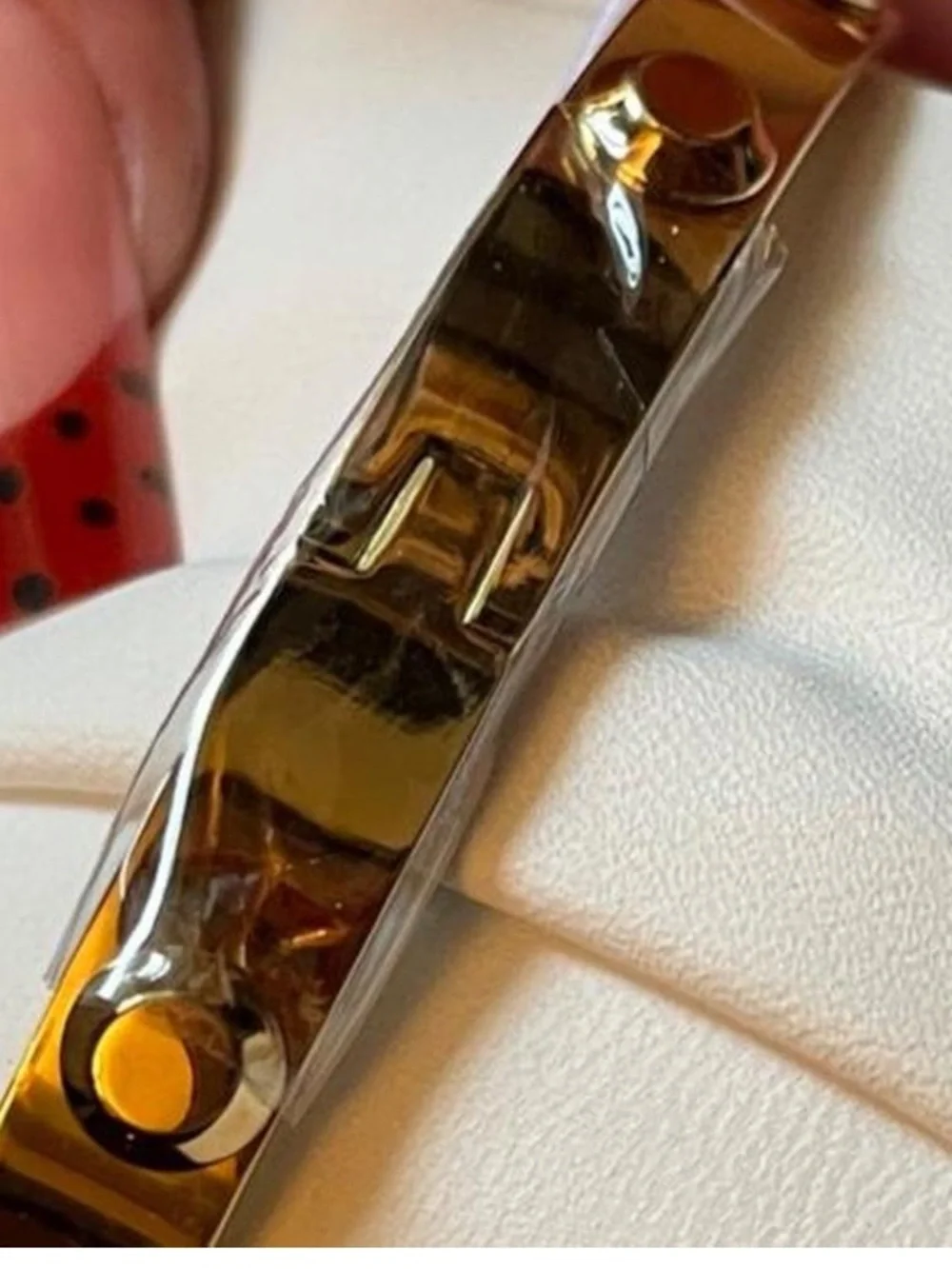 Michael Kors Gold Tone Hinged Logo Bracelet